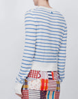 LHD .  Blue sweater